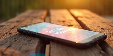 Phone on Dutch wood with newsletter sign-up